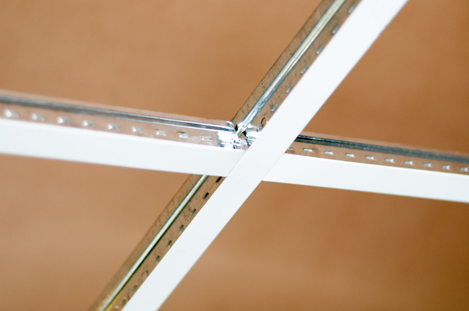 Close-up of Main-T and Cross-T ceiling grid bars clipped together